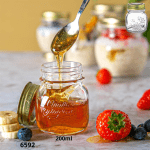 FRASCO DE VIDRIO 200ML C/TAPA DORADA (29873)